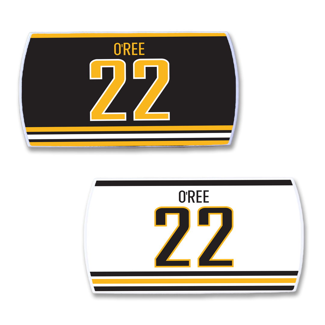 The ZippyBack™ Willie O’Ree set includes two hockey jersey nameplates—one black with gold and white stripes, one white with black and gold stripes—both featuring OREE and 22, honoring hockey’s history.