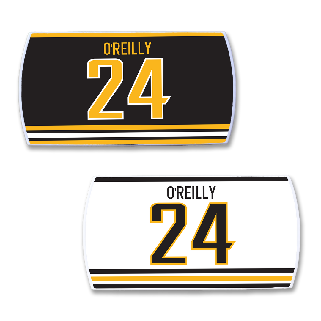Two ZippyBack™ Terry O’Reilly hockey nameplates: one black with yellow/white stripes and yellow "OREILLY 24", and one white with black/yellow accents and "OREILLY 24" in black/yellow—tough looks for a leader on the ice.