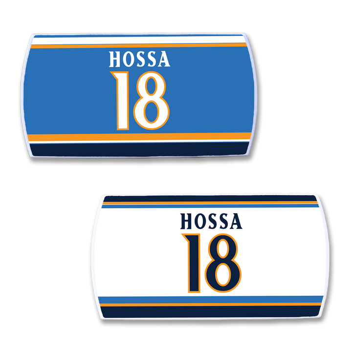 Two ZippyBack™ Marian Hossa name and number patches—HOSSA 18 in blue, gold, and white—one on a blue background, one on white with blue and gold stripes.