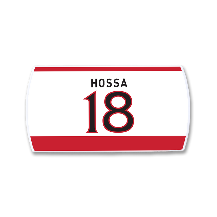 The ZippyBack™ Marian Hossa nameplate is a white hockey jersey patch with red borders, his name in black, and number 18 in red with a black outline—honoring his elite scoring and legendary presence on the ice.