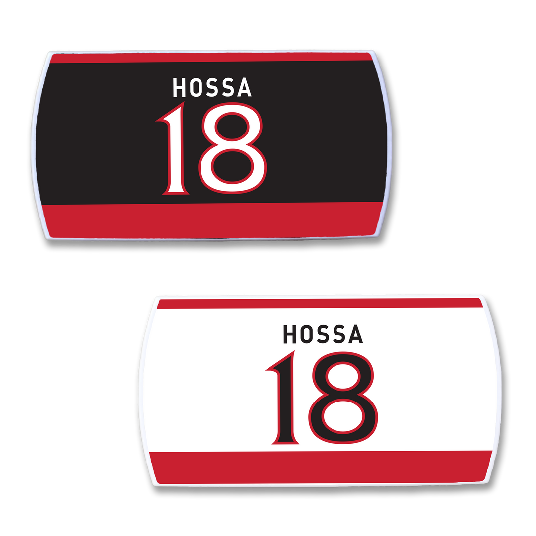 Two ZippyBack™ Marian Hossa hockey jersey nameplates—one black and red, one white and red—feature "Hossa" and number 18 boldly displayed, representing his outstanding scoring talent and defensive skills.